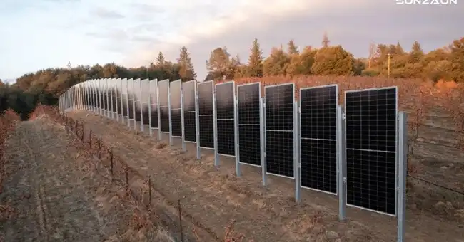 A vertical solar noise barrier along a highway